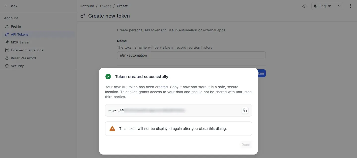 نافذة Token created successfully في NocoDB مع تحذير بأن الرمز لن يظهر مرة أخرى (الرمز مموه)